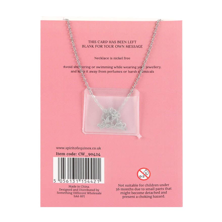 Collier de lune en cristal de quartz rose sur carte de vœux